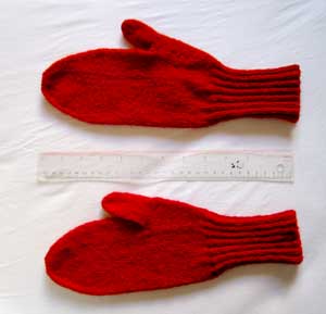 Finished mittens with ruler