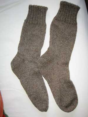 Socks knit and ends bound in