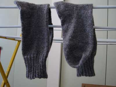 Socks drying on clothes rack