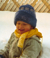 Two year old child wearing hat