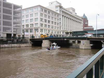 Boat searching Milwaukee River